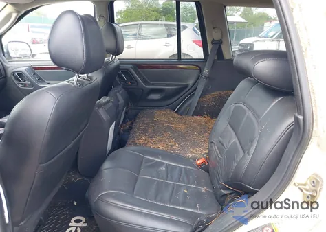 2002 Jeep Grand Cherokee Limited из США, поврежденный, VIN 1J8GW58J22C115460